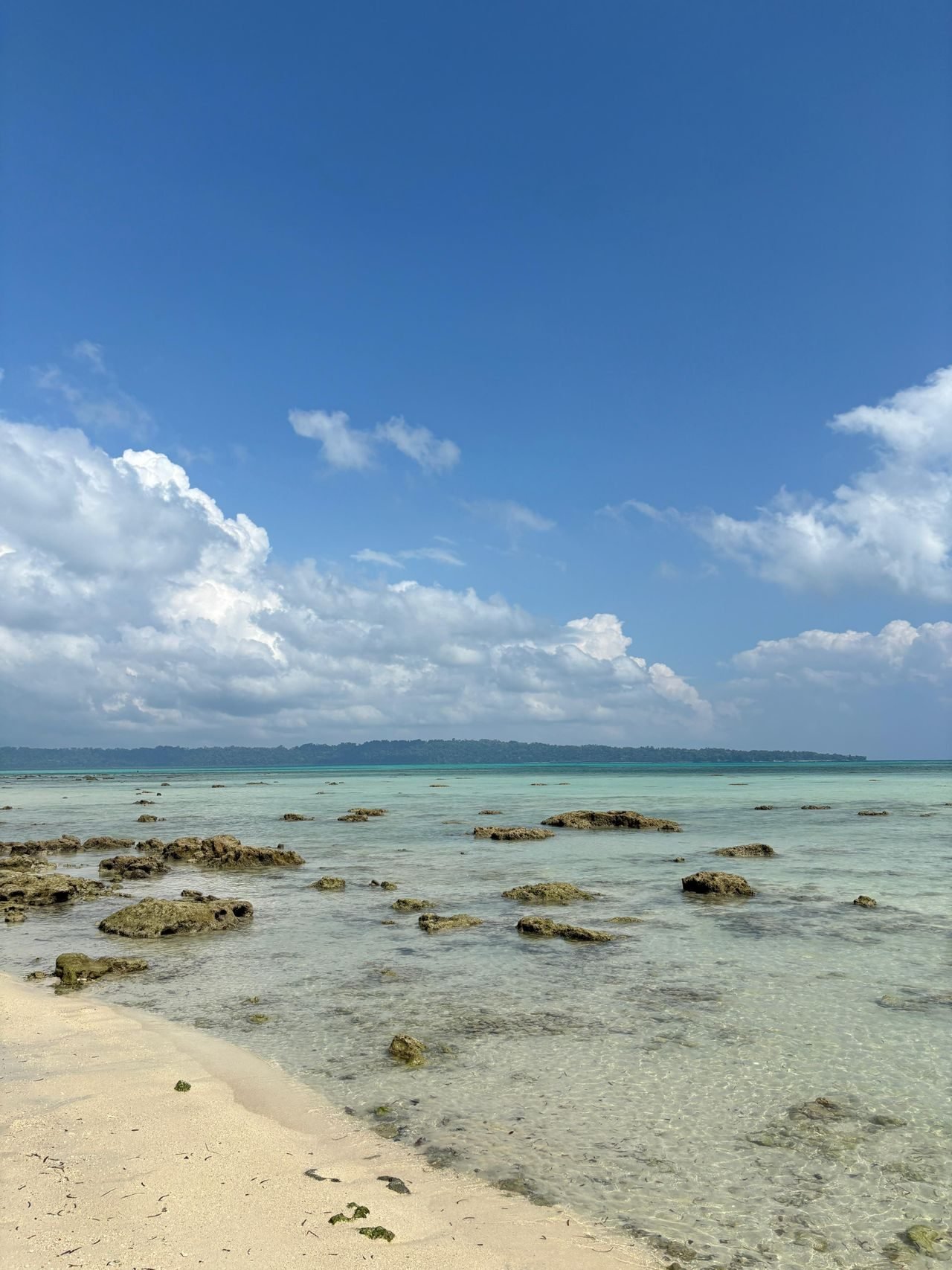 A shallow turquoise Andaman lagoon and beach