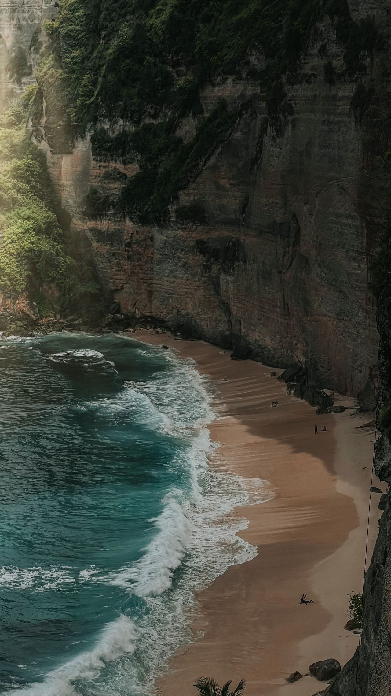 Secluded cliff-backed beach in Bali