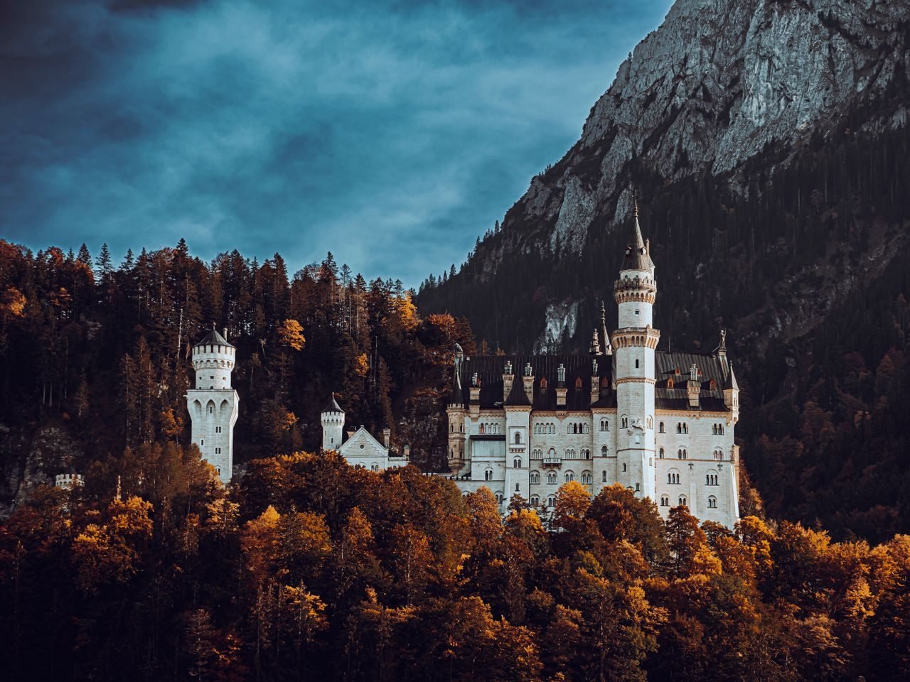 Neuschwanstein Castle amid autumn alps, Germany