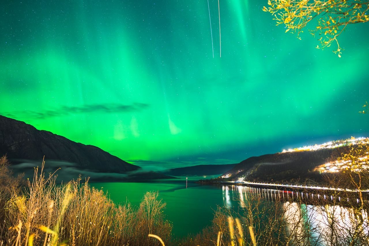 The Northern Lights over a Norwegian fjord
